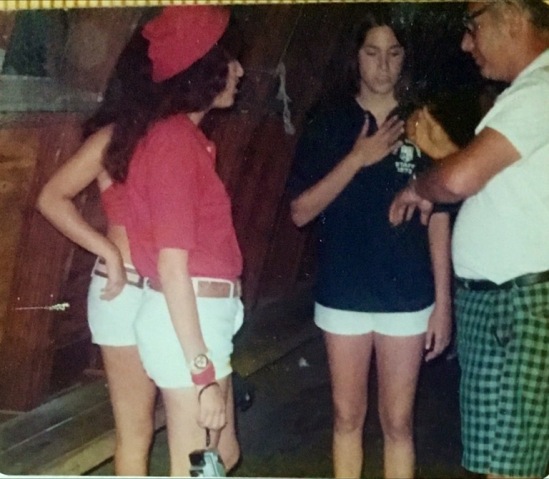 Early 1970's: Captains Steffi Baer and Myra Holt toss a coin toss to determine who sings first in girls songfest